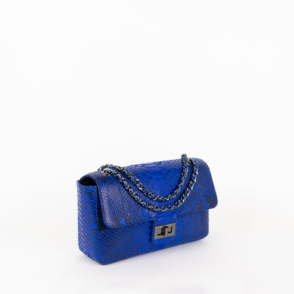 Exotic leather crossbody bag with twist lock closure